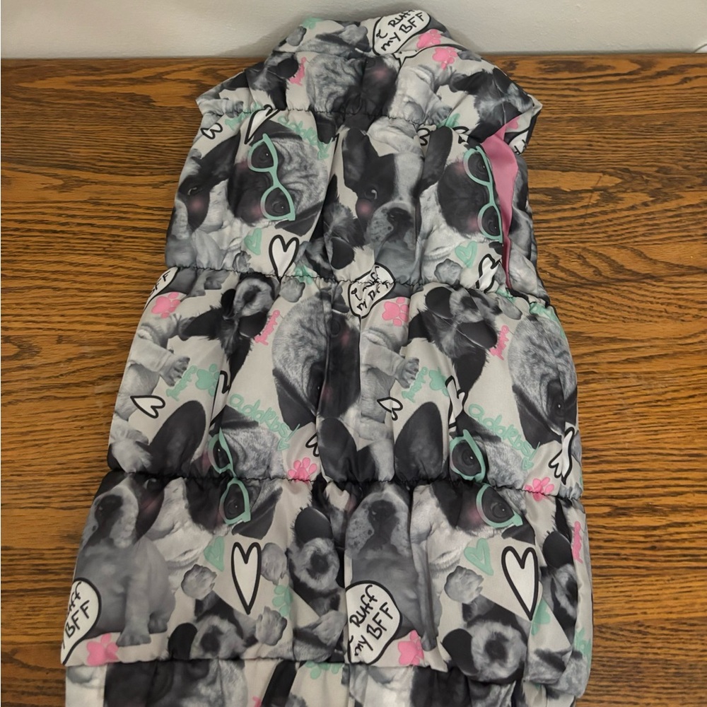 girls vest 6X with dog design zip up and pink interior trim in great condition